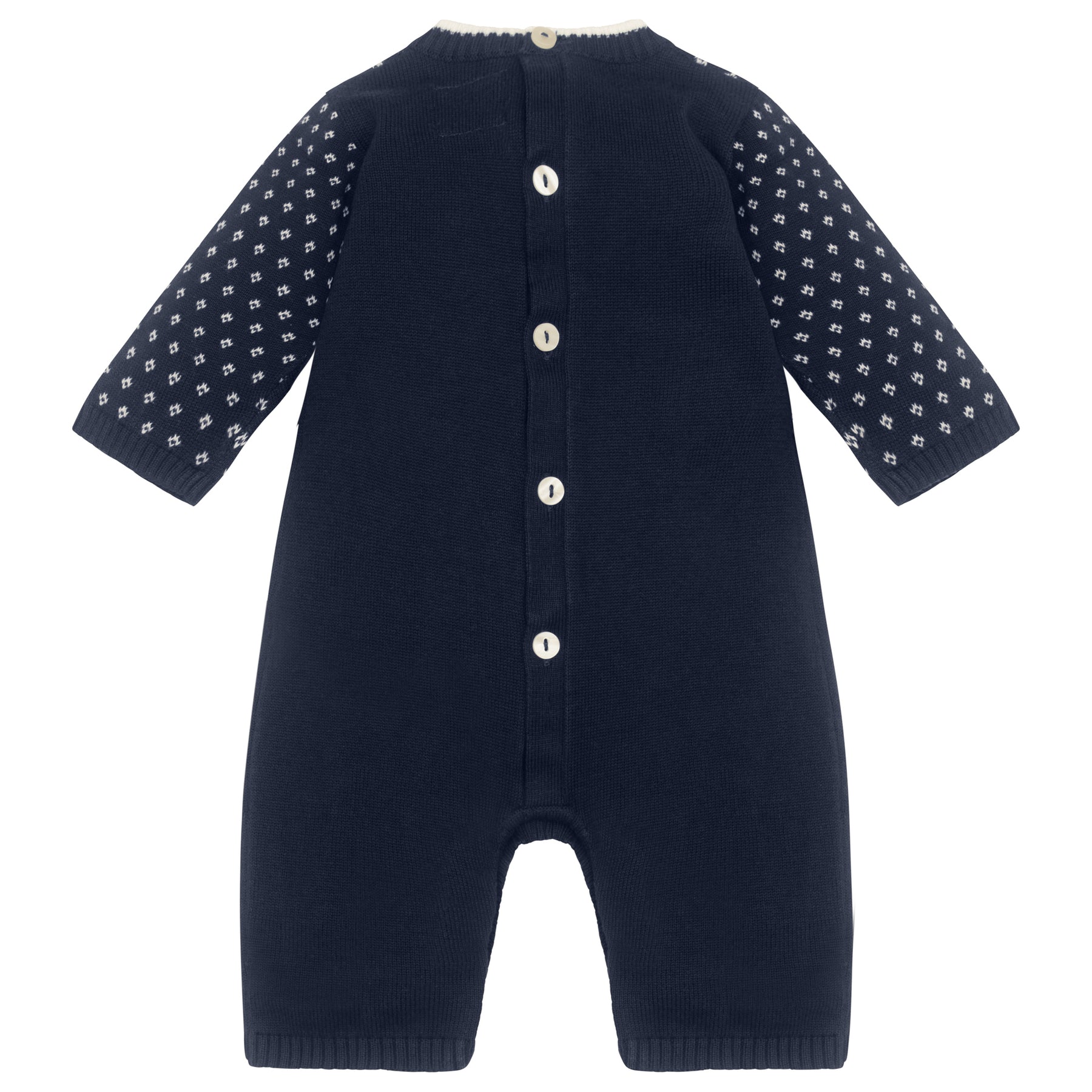 Navy blue baby romper with white button details on a white background