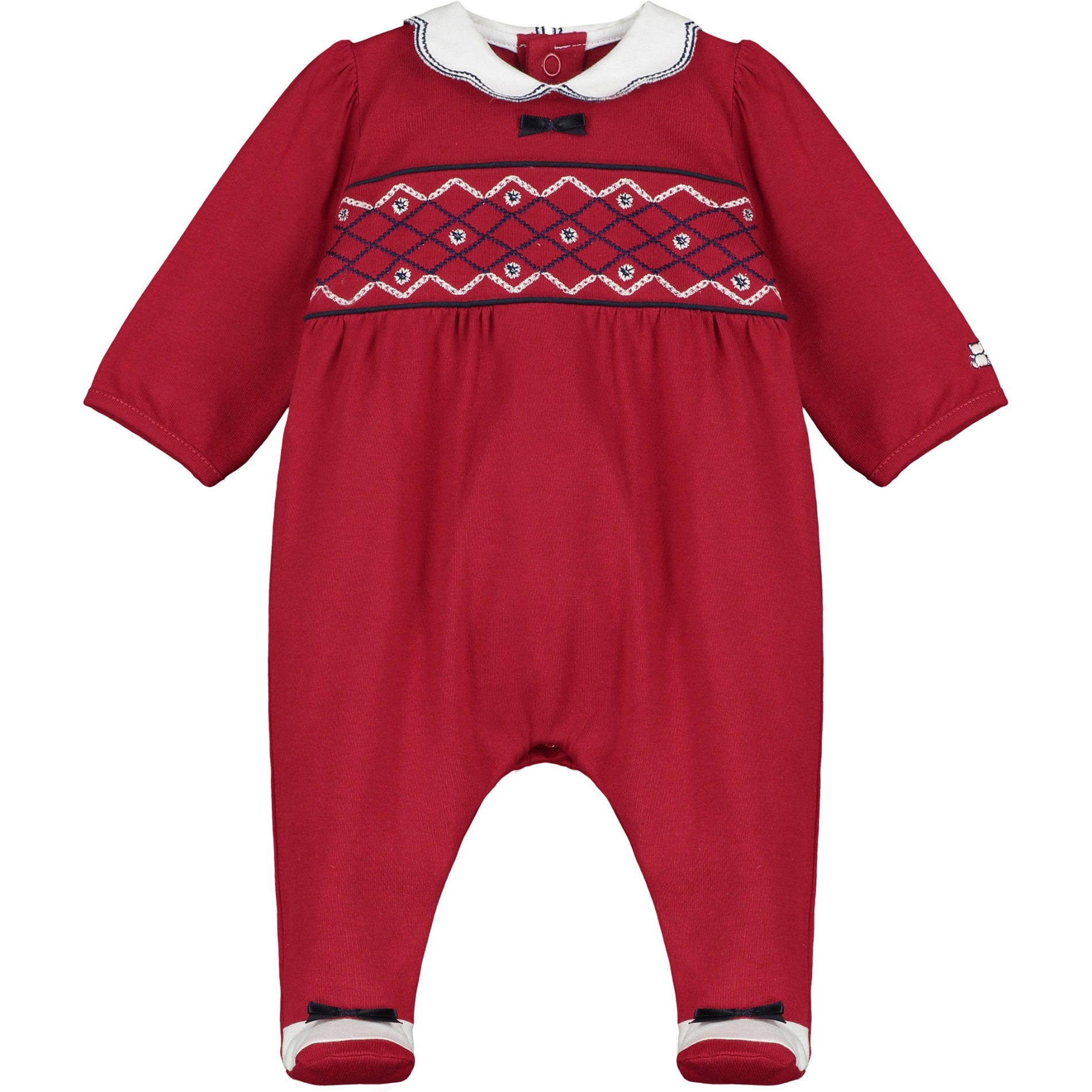 Red baby romper with white collar and black trim on a white background