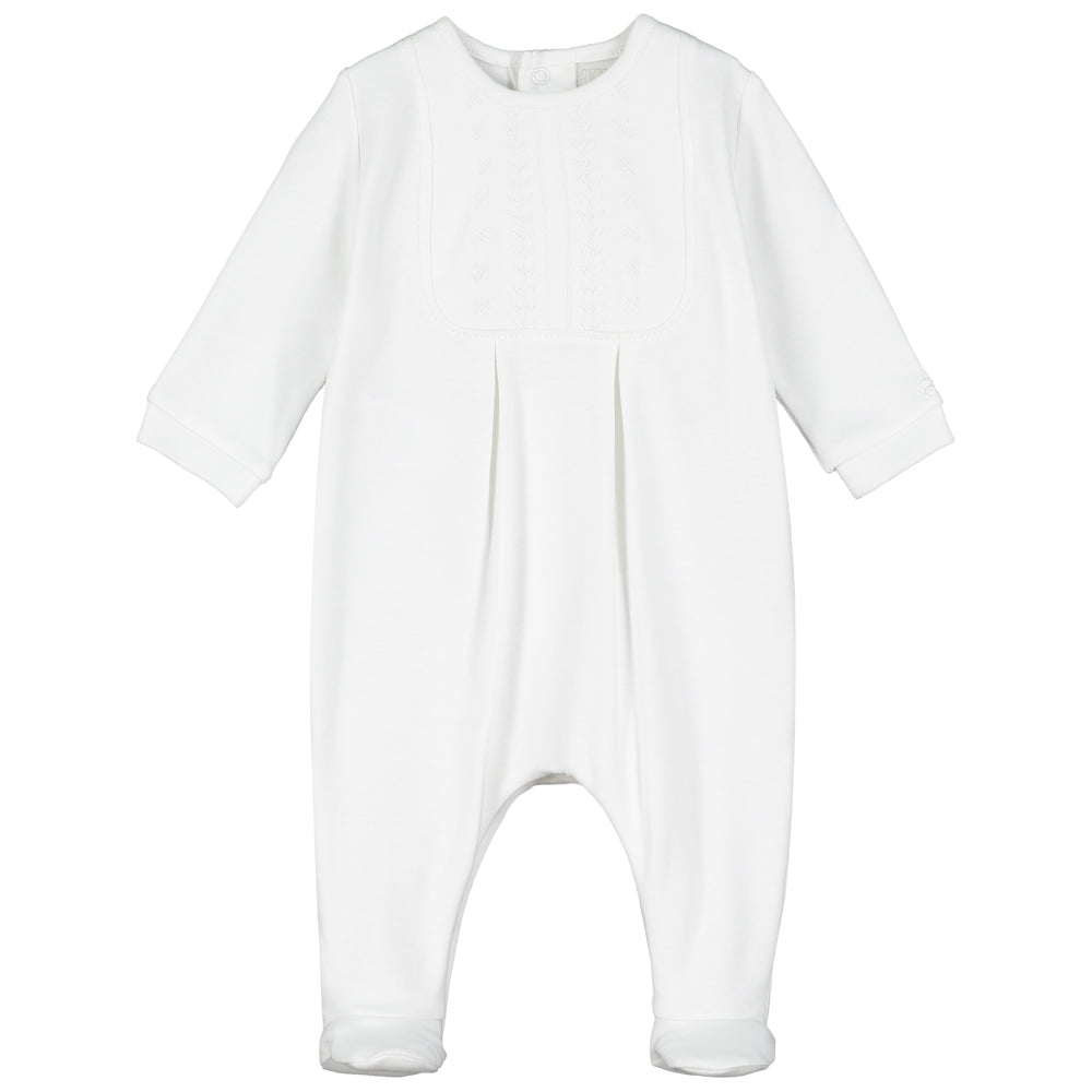 White baby onesie on a white background