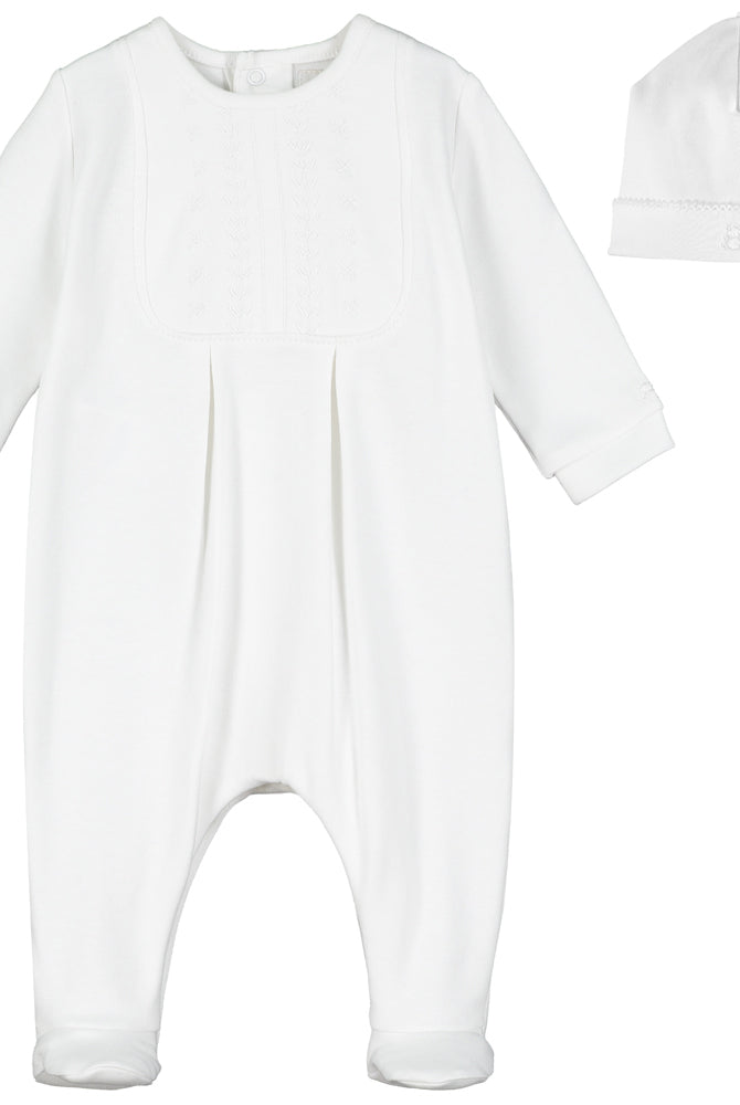 White baby onesie with matching hat on a white background