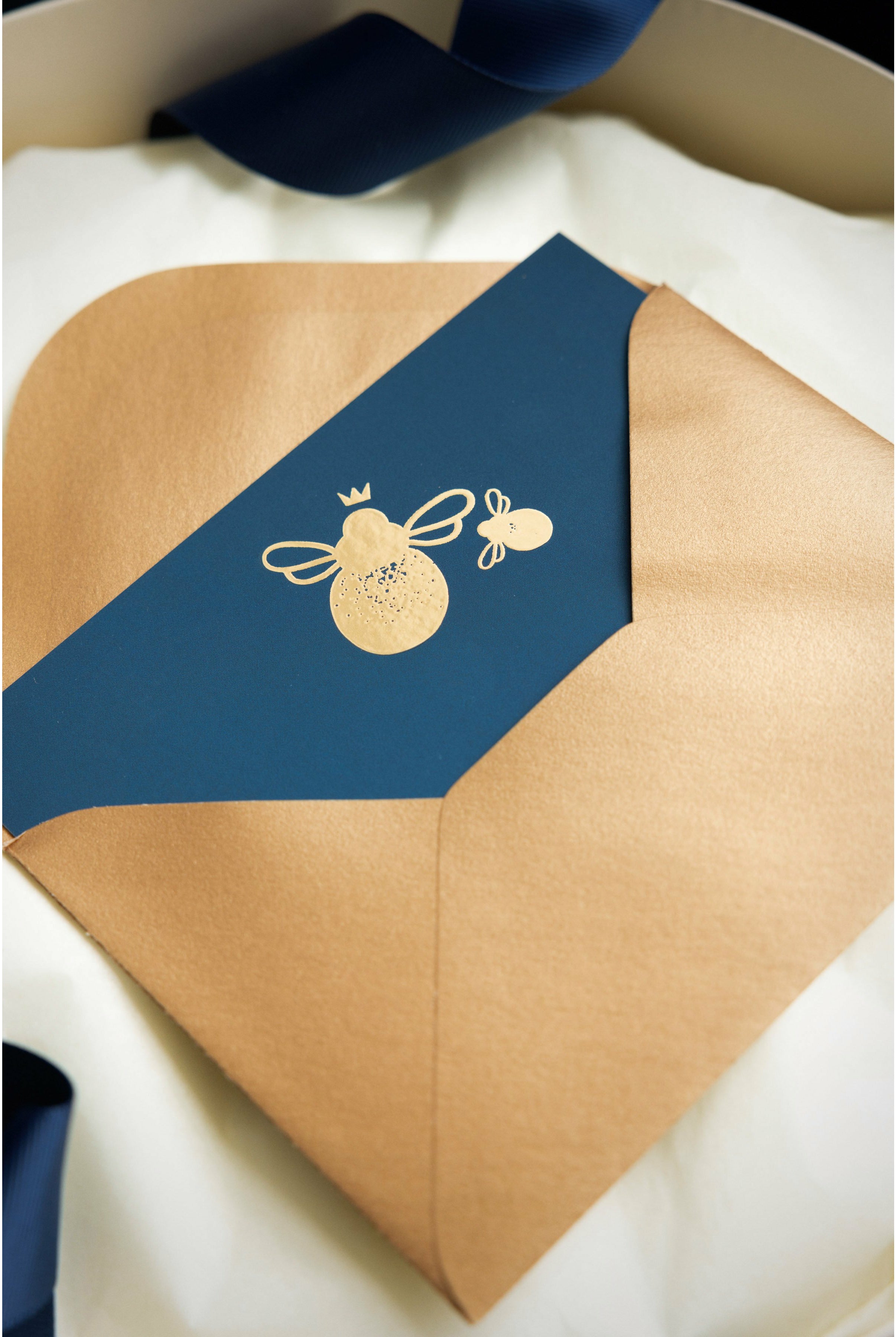 mamas hospital bag luxury stationary gold envelope and navy card with gold bees