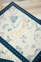 Patterned product with 'The Classic Baby Company' branding on a light background