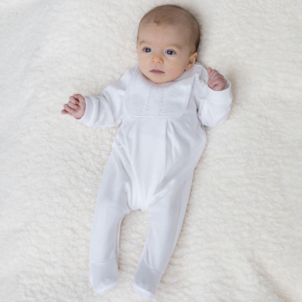 Baby in white babygro - Mamas Hospital Bag Ireland